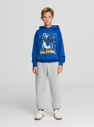 - Spodnie treningowe