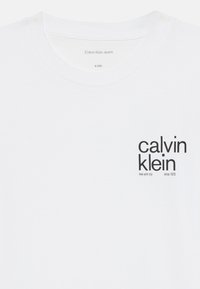 Calvin Klein Jeans SMALL GRAPHIC UNISEX - T-shirt imprimé - bright white