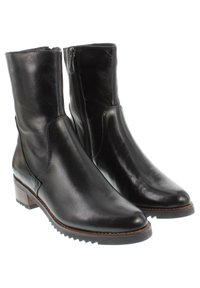 Botas de tobillo de cuero negro con punta redonda, cierre lateral de cremallera y tacón bajo tipo bloque. Textura suave con un diseño minimalista y suela robusta.