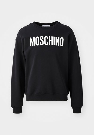 Schwarzer Sweatshirt aus weichem Stoff mit Rundhalsausschnitt und gerippten Bündchen. Auffälliges weißes "MOSCHINO"-Logo auf der Vorderseite.