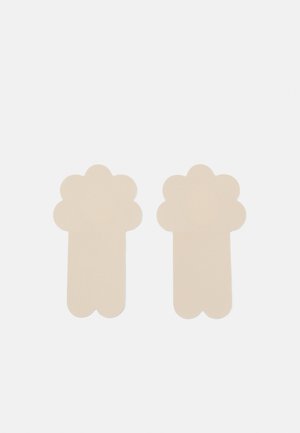Two beige flower-shaped bookmarks with a scalloped design at the top and a straight base. The texture is smooth and flat.
