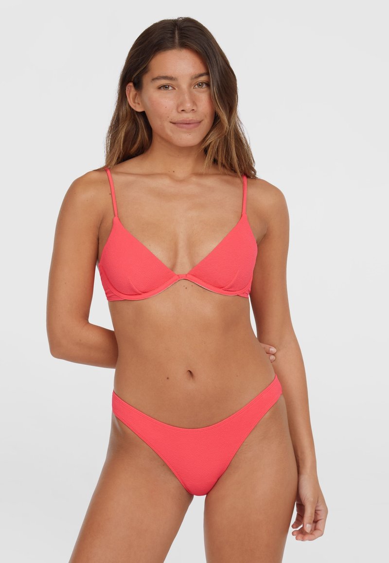 Coral bikini set featuring a textured fabric, triangular cup bra with adjustable straps, and low-rise thong bottom.