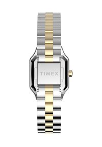 Timex-klocka med silverfärgat armband i rostfritt stål med gulddetaljer. Rektangulärt hölje med polerad yta och krona vid klockan tre.