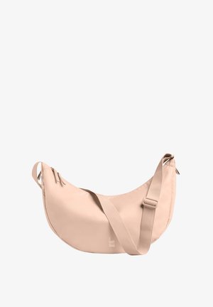 Licht beige schoudertas met een zachte, rond gevormde stijl. Voorzien van een lange schouderband en twee ritsvakjes. Gemaakt van glad, duurzaam materiaal.