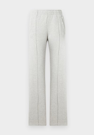 Sivé tepláky z jemnej bavlnenej zmesi, s elastickým pásom, bočnými vreckami a zvislými švami na predných nohaviciach.