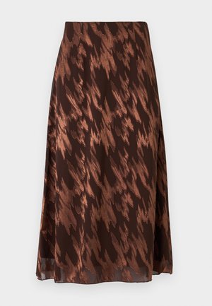 Jupe midi métallique marron et cuivre avec motif abstrait dentelé et silhouette évasée sur fond blanc.