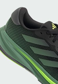 adidas Performance SUPERNOVA RISE - Hardloopschoenen voor op de weg - core black   preloved green   lucid lemon