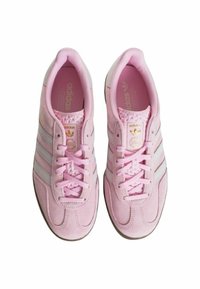 Pink sneakers with suede upper, three white stripes, and rounded toe. Features lace-up design and padded tongue for comfort.