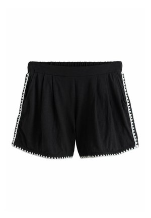 Černé šortky s elastickým pasem a bílým cikcakovým lemováním po stranách a na lemech, s bočními kapsami.