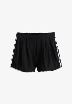 Černé šortky s elastickým pasem a bílým cikcakovým lemováním po stranách a na lemech, s bočními kapsami.