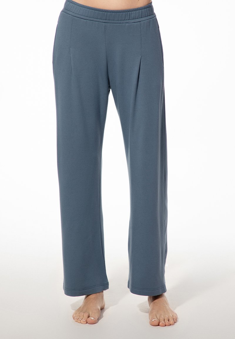 Hellblaue, locker sitzende Hose mit elastischem Bund, seitlichen Falten und glatter Textur, mit geradem Bein.