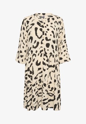 Haljina sa uzorkom leoparda u bež i crnoj boji, s dugmadi sprijeda, rukavima do tri četvrtine i dizajnom suknje s nivoima. Lagan materijal.