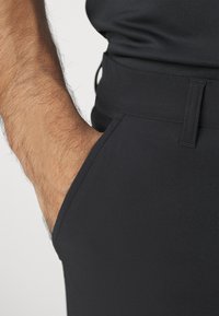 adidas Golf ULTIMATE365 TAPERED - Trousers - black