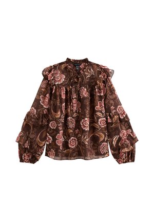Blouse florale marron avec des manches à volants, présentant un col haut et un buste froncé. Le motif comprend des fleurs roses et crèmes sur un fond riche.