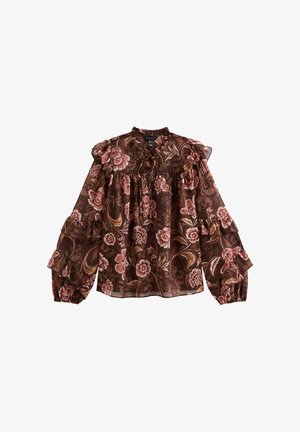 Blusa floreale marrone con maniche a volant, dotata di un collo alto e busto arricciato. Il motivo include fiori rosa e crema su uno sfondo ricco.