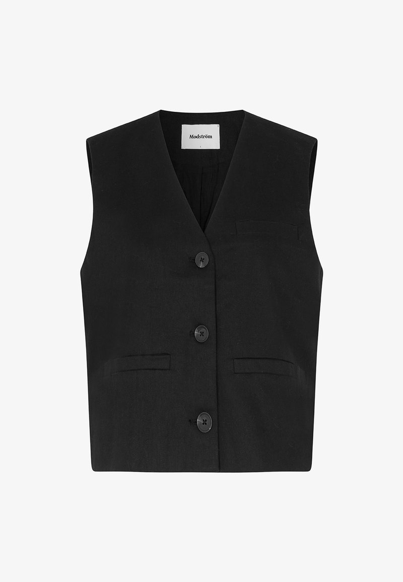Gilet noir sans manches boutonné avec trois boutons et trois poches, présentant un col en V et une étiquette Modström à l'intérieur du col.
