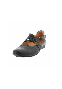 Schwarzer Lederschuh mit Kreuzriemen, Mandelform, niedrigem Absatz und glatter Oberfläche. Das Innere hat eine sandfarbene Fütterung und minimalistische Nähedetails.