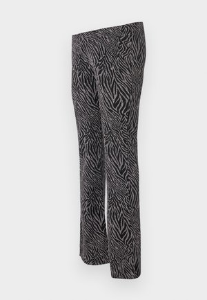 Mustand ja hõbedased legginsid, millel on sebra triibud, veniv kangas, sirge jala disain ja kõrge vöökoht.