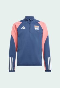 Granatowa kurtka treningowa na zamek półokrągły z różowymi akcentami na ramionach, białymi paskami Adidas na rękawach oraz logo Olympique Lyonnais na piersi.