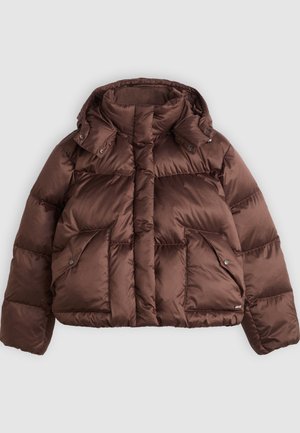Brown puffer jacket with a high collar, snap buttons, and two front pockets. Made of glossy, quilted fabric with a cropped design.