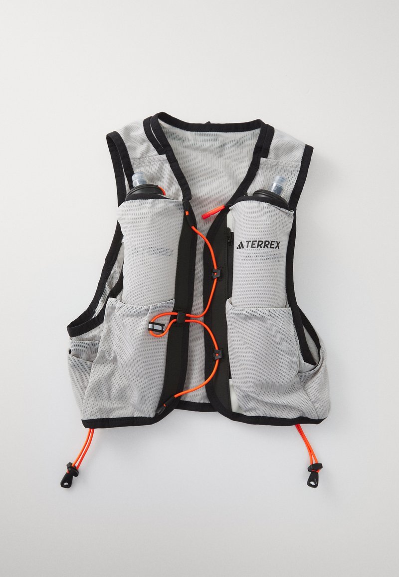 Gray mesh vest with black accents, two front pockets for water bottles, and an orange cord for adjustment. Lightweight and breathable design.