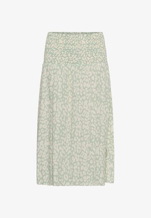 Jupe vert clair avec taille haute froncée et motif léopard blanc irrégulier, longueur genoux, tissu fluide.