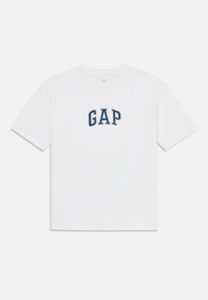 Balta medvilninė t-shirt palaidinė su trumpomis rankovėmis ir apvaliu iškirpimu, ant priekinės dalies su tamsiai mėlynu siuvinėjimu "GAP" logo.