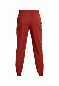 Under Armour Tygbyxor - orange
