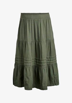 Jupe verte olive, à plusieurs niveaux, avec un taille smockée. Dotée de surpiqûres horizontales et de détails brodés floraux près de l'ourlet. Fabriquée en tissu léger.