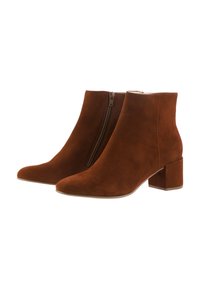 Pair of brown suede ankle boots with side zipper, rounded toes, and block heels on a white background.