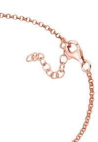 Kedja i roséguld med ihopkopplade ovala former och en kräftklämma. Har en justerbar förlängning för storleksanpassning. Slät textur och polerad yta.