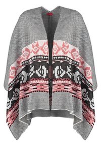 Sort-hvid mønstret poncho med V-udskæring, prydet med en pink geometrisk kant. Blødt stof med en løs, flagrende form.