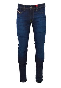 Jean slim bleu foncé avec un léger délavage et des coutures jaunes, comportant des poches avant et des passants de ceinture, isolé sur fond blanc.