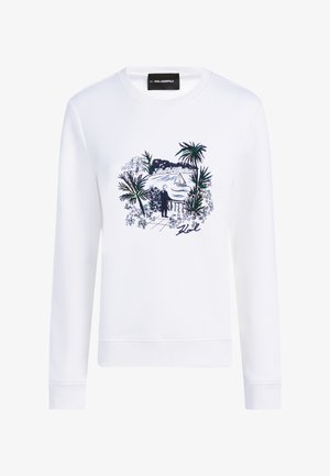 Fehér pulóver hosszú ujjal, kerek nyakkivágással, és grafikával, amely trópusi pálmákat, egy tájat, valamint tengerészhajó motívumot ábrázol tengerészkék és zöld színekben.
