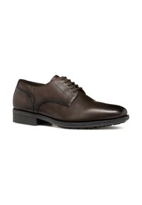 Elegante scarpa da uomo in pelle marrone con finitura liscia, punta rotonda, design con lacci e tacco in gomma basso per aderenza e comfort.