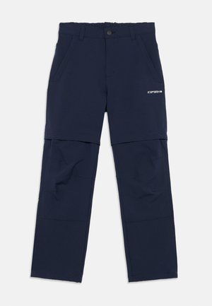 Navy blue outdoor pants with a flexible waistband, two front pockets, and a brand logo. Features a zippered section for adjustable length.