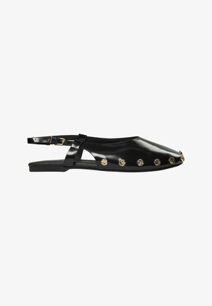 Black patent leather slingback flat shoe with gold round studs along the side and pointed toe with adjustable buckle strap.