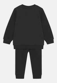 Puma MINICATS CREW JOGGER UNISEX SET - Tepláková souprava - black