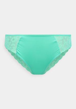 Turquoise women's bikini briefs with mesh leopard print side panels and scalloped edges on a plain background.