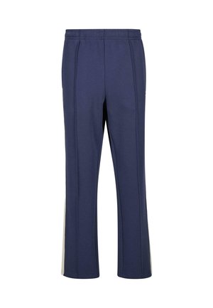 Pantaloni sportivi blu navy con elastico in vita e dettagli sulle cuciture laterali, design a gamba dritta e strisce chiare sui lati esterni.