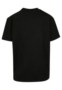 Black cotton t-shirt, short sleeves, standard crew neck, no visible logos or patterns, solid color, relaxed fit, smooth texture.
