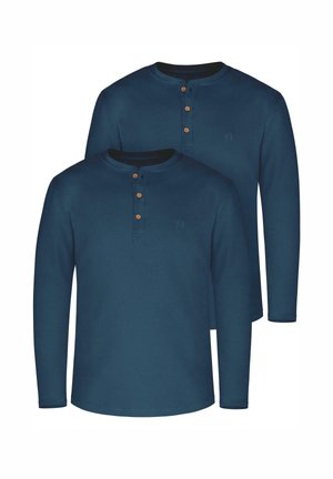 Langärmlige, marineblaue Hemden aus weichem Stoff mit Rundhalsausschnitt, Knopfleiste mit drei Knöpfen und kleinem Logo-Detail auf der Brust.