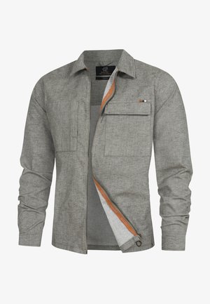 Gray, long-sleeve shirt with a zip front, two chest pockets, and orange accents on the interior. Made of textured fabric.