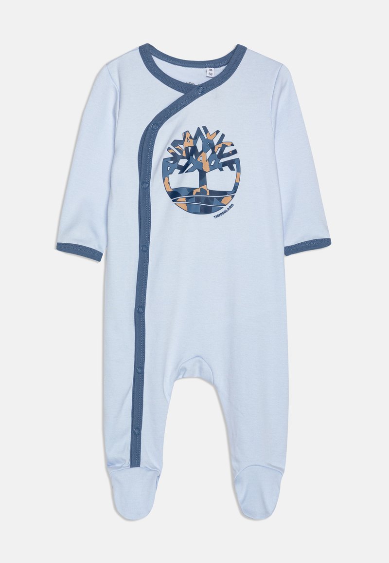 Monosie azul claro con mangas cortas, ribete azul oscuro, cierres a presión y un gráfico circular de un árbol en naranja y azul marino. Material de algodón suave.