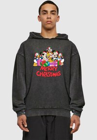 Charcoal hoodie featuring a graphic of Disney characters with Christmas hats around colorful gifts and "MERRY CHRISTMAS" in bold red text.