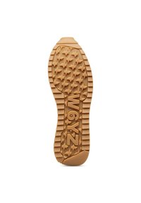 Suola in gomma, di colore beige con motivi a stella. Presenta scanalature per la trazione e un marchio alfanumerico in rilievo "W6YZ" per il branding.