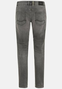 Grå denim jeans med slim fit, der har to baglommer og en kontrasterende gul lynlåsdetalje på taljen.