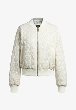Giacca bomber bianca trapuntata con polsini e orlo a coste, dotata di chiusura con zip e tasca laterale; finitura liscia e texture a motivo diamante.