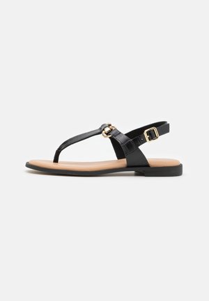 LIMBA - Sandalias de dedo - black