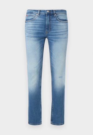 Jean slim bleu homme avec face avant délavée, design classique cinq poches, fermeture par boutons et passants de ceinture.